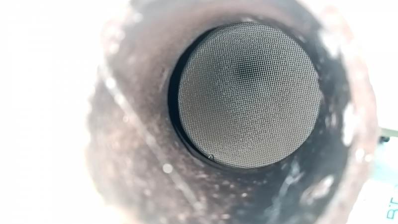 The exhaust pipe, the middle part with a catalytic converter, Hyundai Santa FE Sport 17-18 rest 2.4 is dented and rusty.