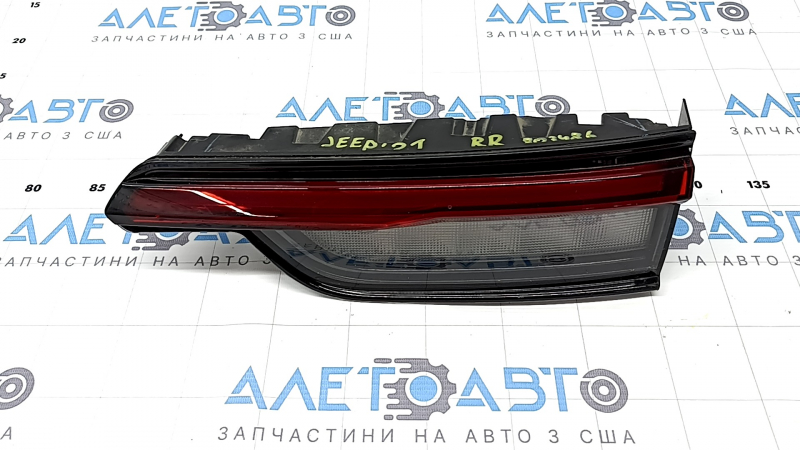 Right inner tailgate light for Jeep Grand Cherokee WL 21-25 LED, long, scratches, broken mount, debris inside