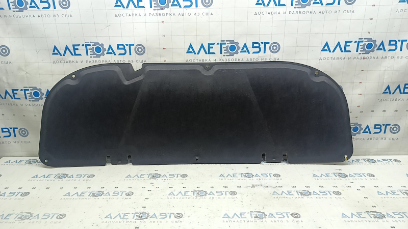 The hood insulation of a Toyota Venza 21-24 is torn, the coating is peeling off on the back side.