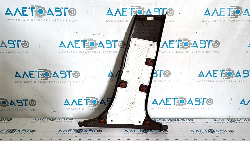Lower left center pillar trim for a 1998 Cadillac ATS, brown, scratches