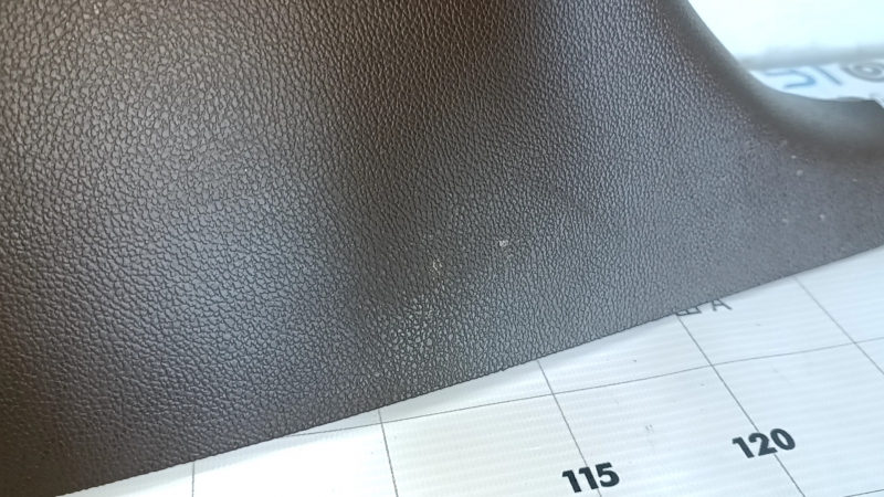Lower left center pillar trim for a 1998 Cadillac ATS, brown, scratches