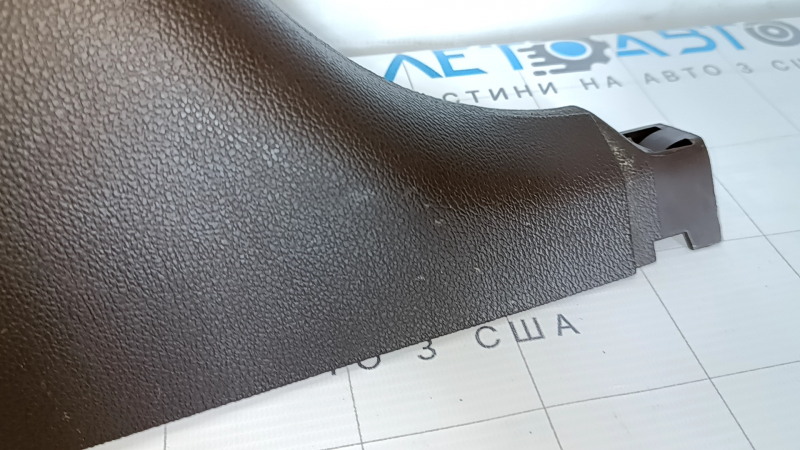 Lower left center pillar trim for a 1998 Cadillac ATS, brown, scratches