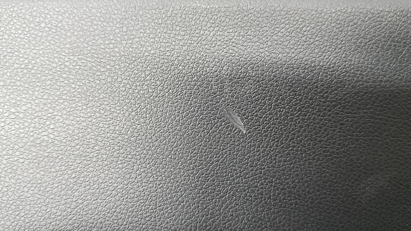 Kia Sportage 17-22 black rear left door panel, black eco-leather armrest, gray stitching, scratches