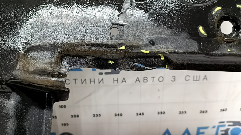 The left underbody protection of a Toyota Camry v70 18-24 is torn.