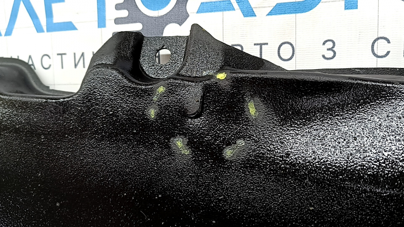 The left underbody protection of a Toyota Camry v70 18-24 is torn.