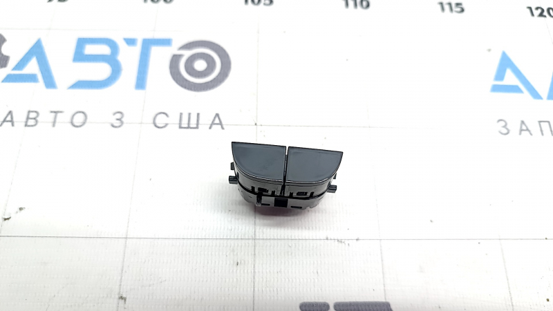 Central lock button for the front right door of a Nissan Ariya 23-25