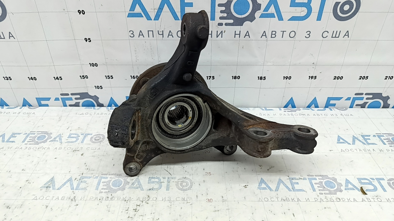 The front left axle with hub for a Lexus RX350 RX450h 10-15 is rusty and wedge-shaped.