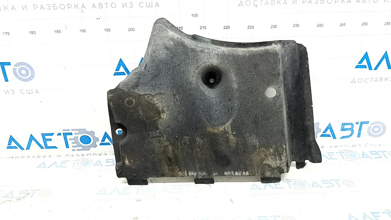 The front left underbody protection of the Audi A6 C7 12-18 is worn and dented.