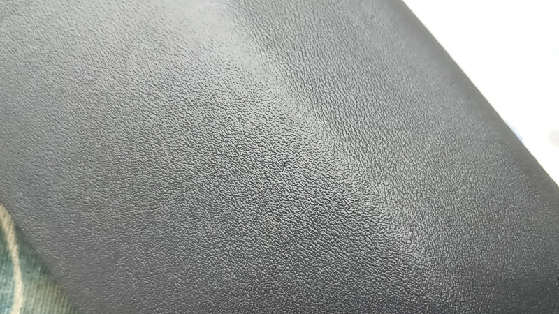 Right passenger knee airbag for an Infiniti QX50 19-25, black, scratched