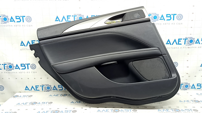 Black rear left door panel for a 17-20 Lincoln MKZ, with leather insert, black leather armrest, under tweeter, under speaker, with chrome molding, dent, scratches on molding