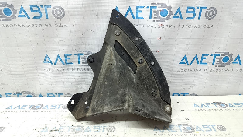 The front left fender liner of the Mazda CX-30 20-23 is worn and broken.