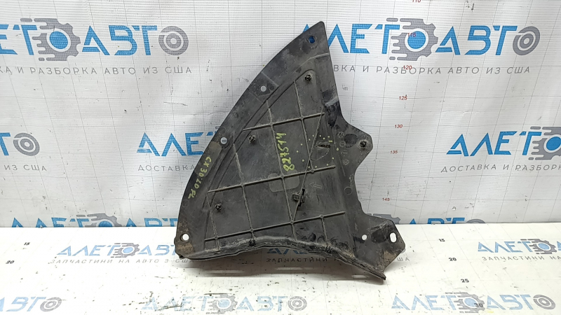 The front left fender liner of the Mazda CX-30 20-23 is worn and broken.