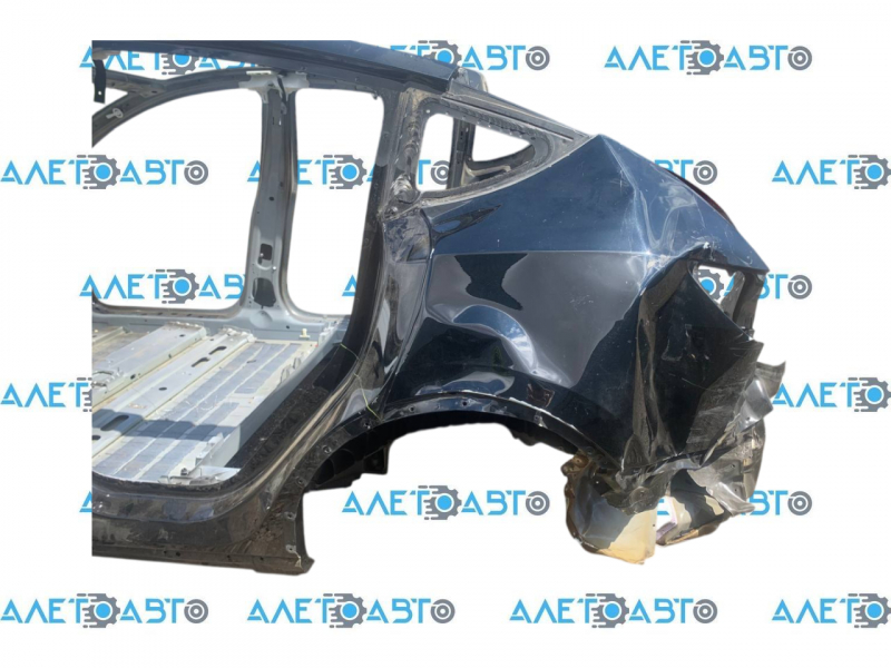 Tesla Model Y 20-25 black PBSB rear left quarter wing, on the body, wrinkled