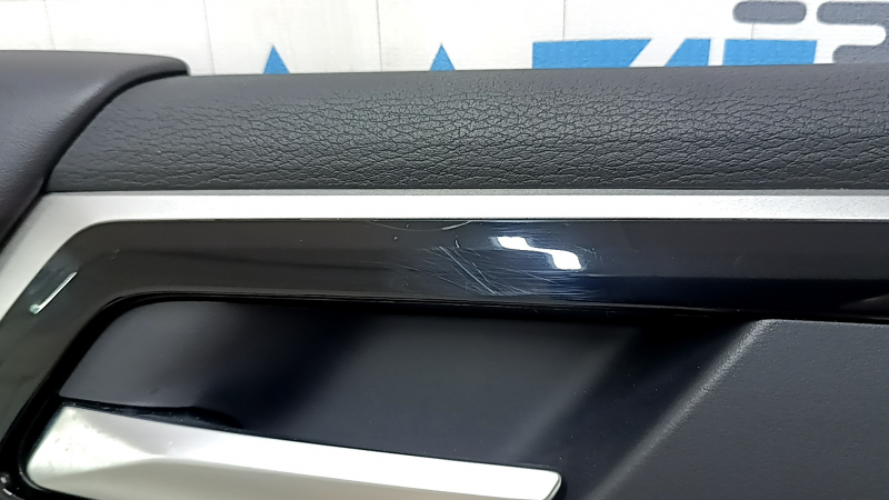 Mitsubishi Outlander 22-25 black front left door panel, armrest and insert, black leather, gray stitching, glossy black molding with chrome, with handle, scratches