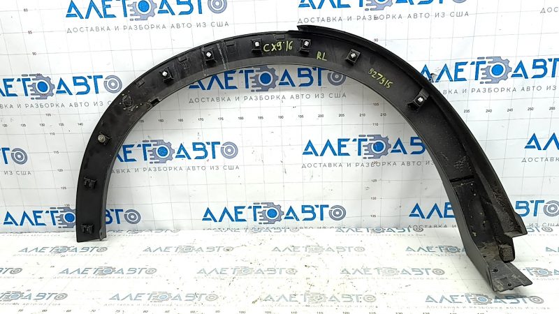 Rear left fender arch trim Mazda CX-9 16-23 structure, broken fasteners, cracks in fasteners, scratches