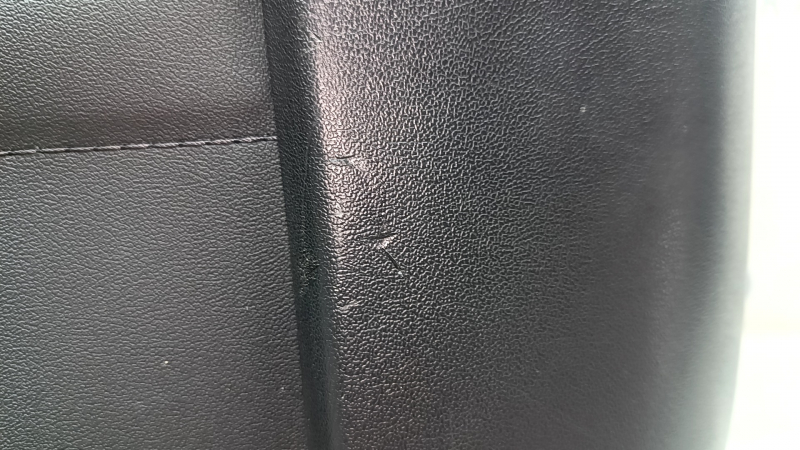 Tesla Model Y 20-25 black rear driver's seat trim, broken fasteners, scratches