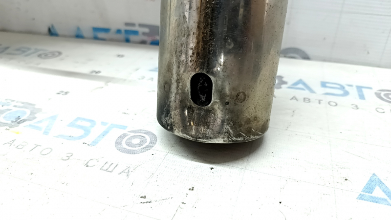 The rear muffler with barrels of a Mazda CX-9 16-23 is rusty, the insert is sawed off, the tip is dented