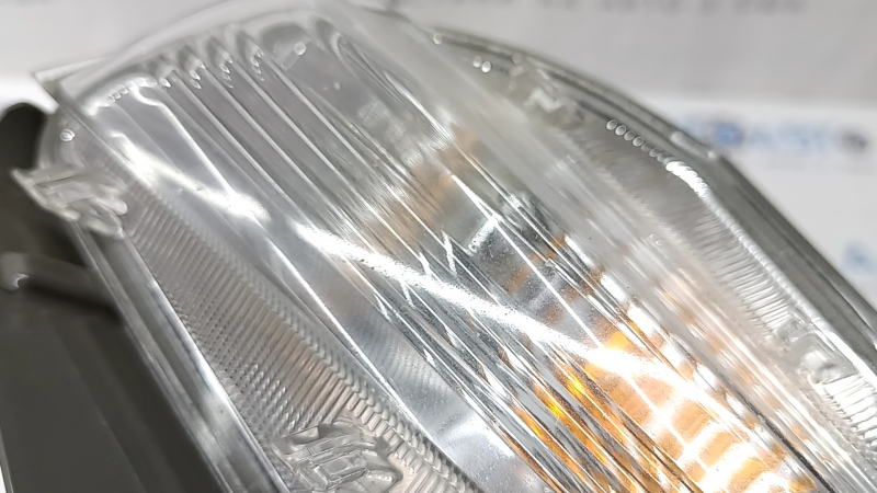 Left turn signal for a 1992 Toyota Prius V, sand, crack in the glass.