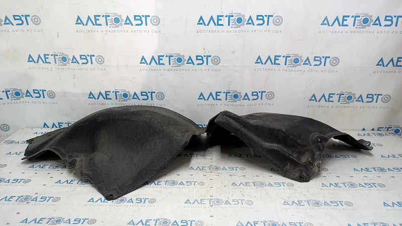The rear right fender liner of a Honda Accord 23-24 is torn.