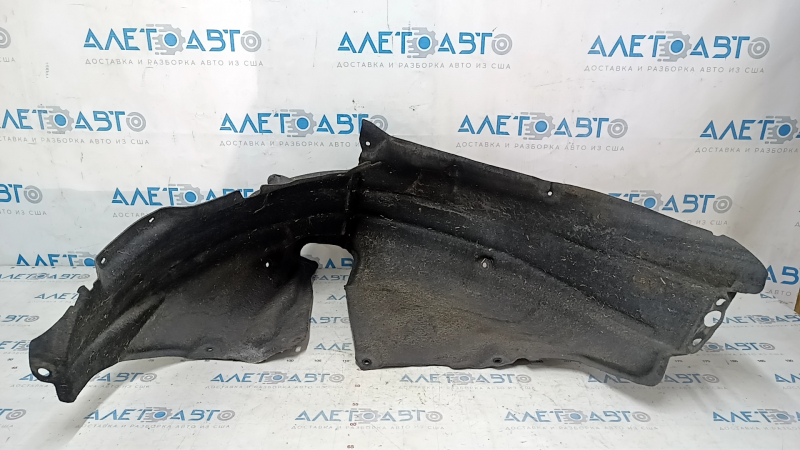 The rear right fender liner of a Honda Accord 23-24 is torn.