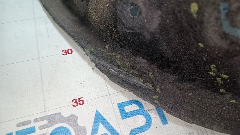 The front left fender liner of a Chevrolet Equinox 18-24 is torn.
