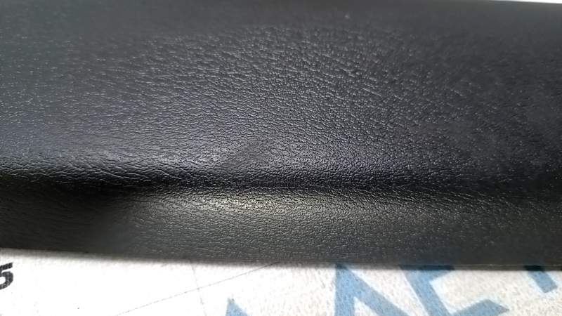 Upper trunk door trim for a Nissan Pathfinder 13-20, black, scratched, worn
