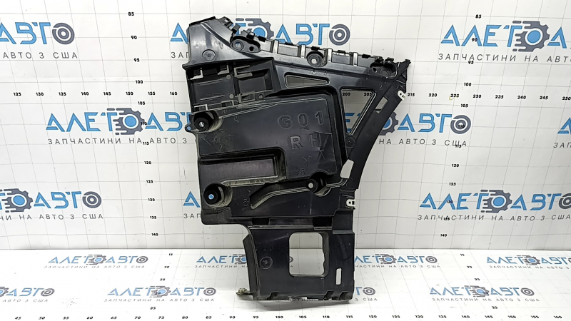 The lower right rear bumper mount for the BMW X3 G01 18-21 is broken.