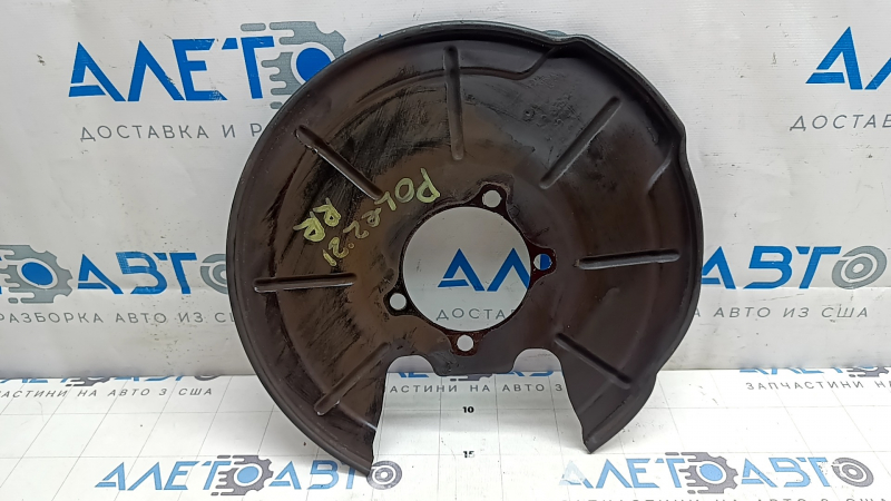 The rear right brake disc cover for a Polestar 2 21-25 is dented.