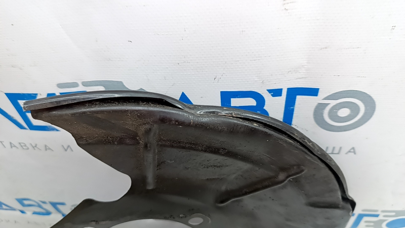 The rear right brake disc cover for a Polestar 2 21-25 is dented.