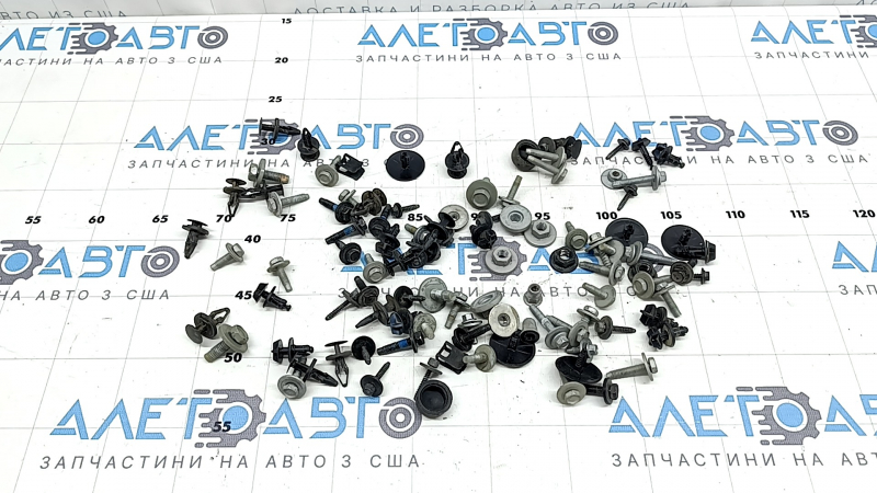 Incomplete set of hardware for the bumper, hood, and fenders of a Ford Explorer 20-23