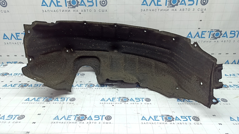 The rear right fender liner of a Lexus CT200h 11-17 has torn fasteners.