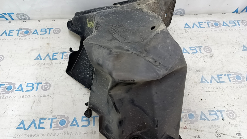 The right rear bumper guard for a Lexus CT200h 11-17 is dented.