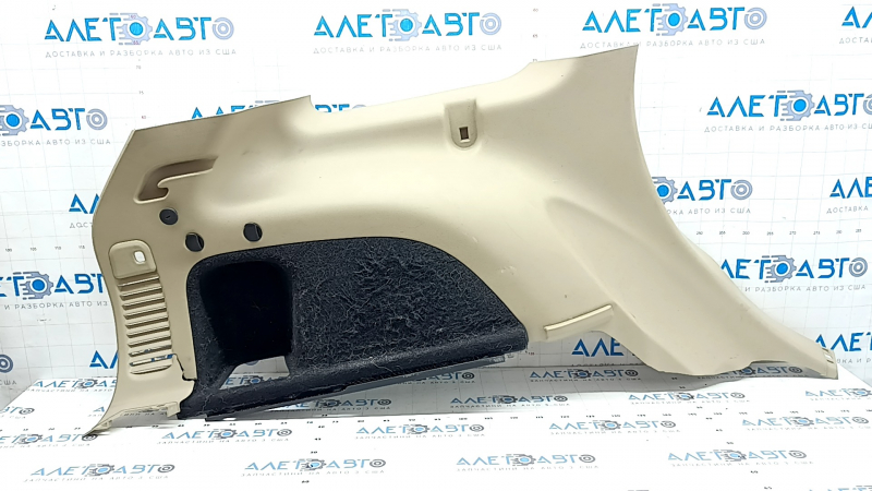Left arch trim for a Jeep Grand Cherokee WK2 18-20, beige, electric, with hooks, scratches, crack, needs cleaning