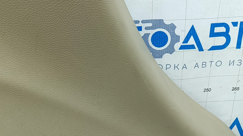 Left arch trim for a Jeep Grand Cherokee WK2 18-20, beige, electric, with hooks, scratches, crack, needs cleaning