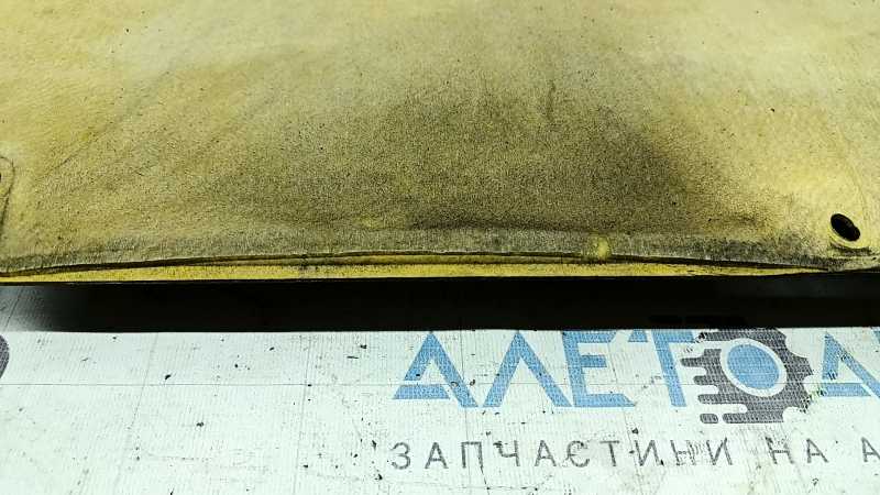 Toyota Venza 21-24 hood insulation has tears and the coating has peeled off on the back side.