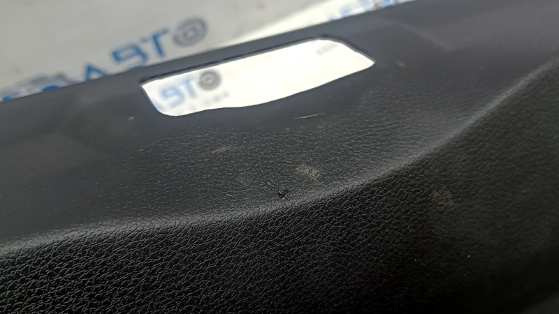 Jeep Renegade 15-23 black tailgate trim with scratches, cracks in fasteners, and abrasions
