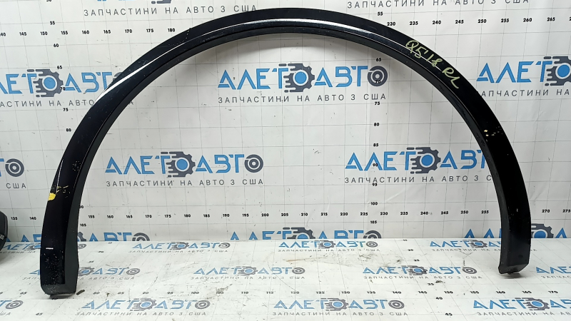 Rear left fender arch trim for Audi Q5 80A 18-24, minor scratch, broken fasteners