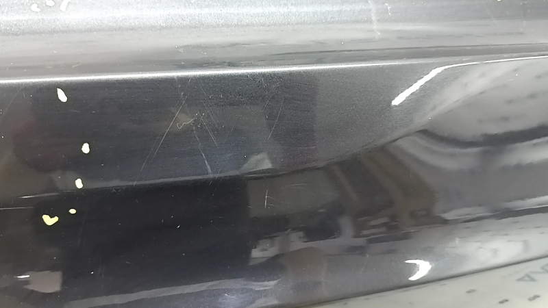 The trunk door is bare, the lower part of the BMW X5 F15 14-18 graphite A90, there are nicks, scratches, and a dent.