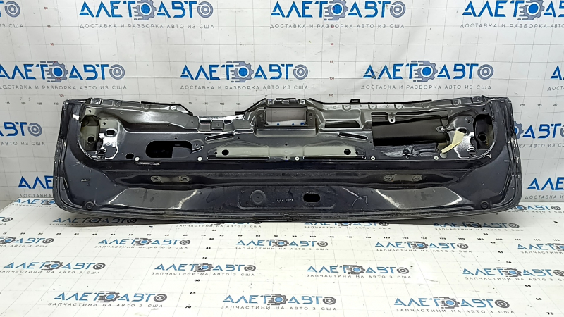 The trunk door is bare, the lower part of the BMW X5 F15 14-18 graphite A90, there are nicks, scratches, and a dent.