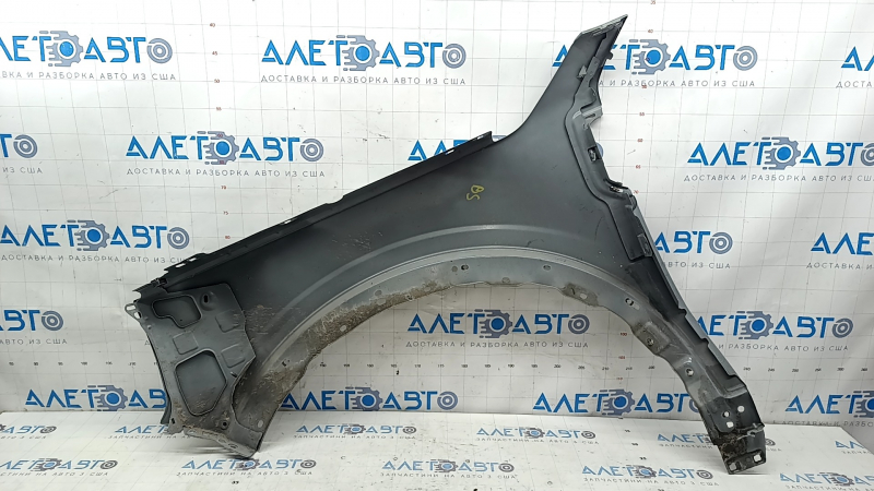 Front right fender of a 2015 Ford Bronco Sport, gray NE, chip, scratch