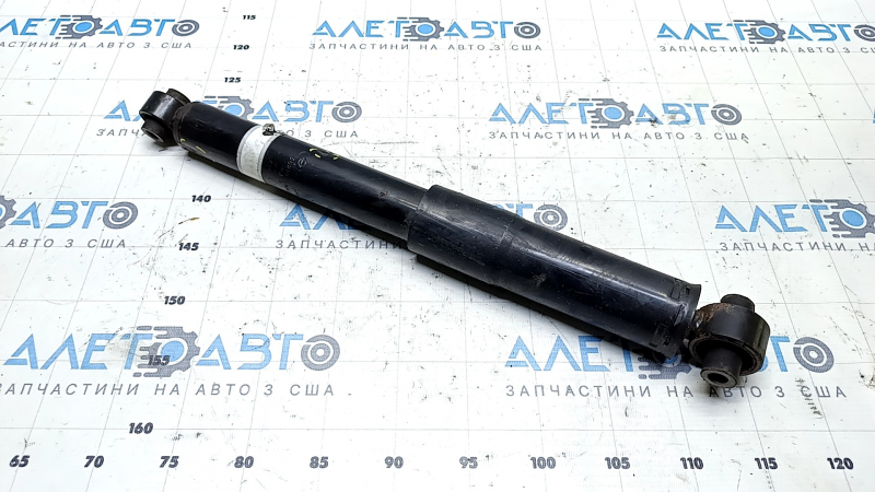 The rear right shock absorber of the Nissan Rogue Sport 17-22 is dented.