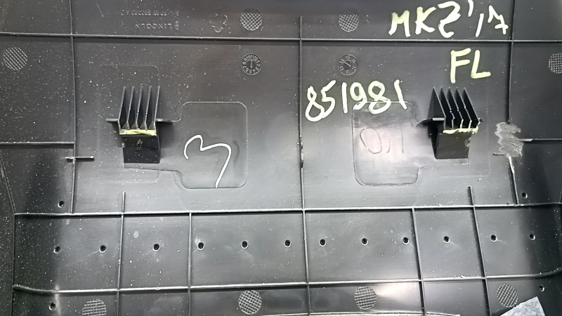 Lincoln MKZ 13-20 black rear driver's seat cover, broken fasteners, broken fastener, cracks in fasteners, tear, dented