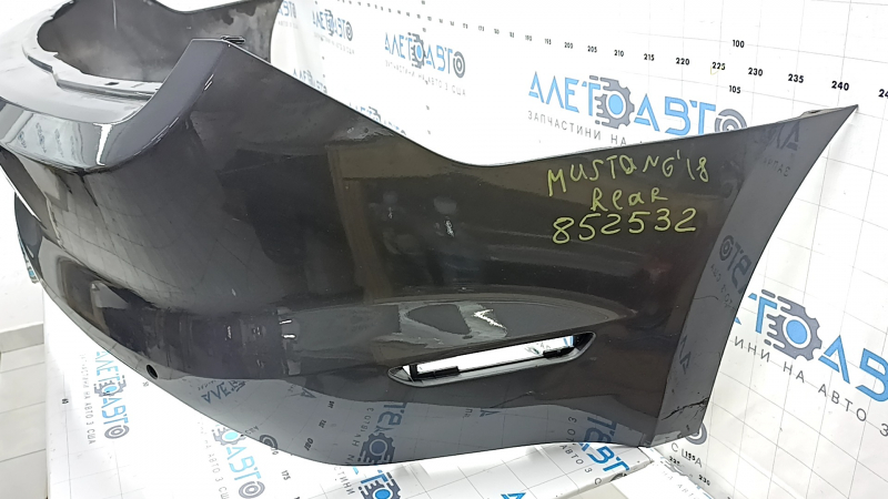 Bare rear bumper for Ford Mustang mk6 18-23 with parking sensors, graphite