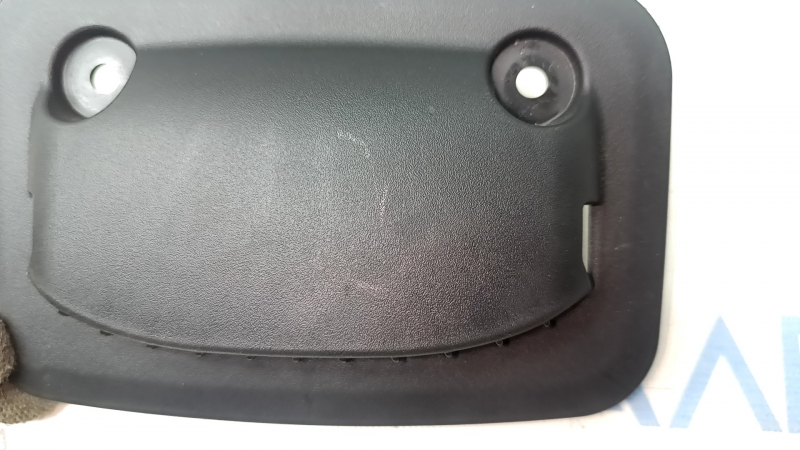 The right Kia EV6 heater duct trim has some wear and tear.