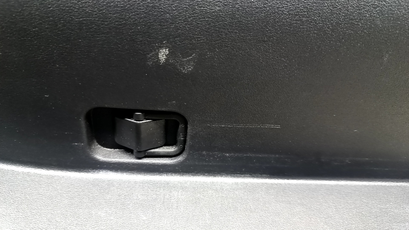 Kia EV6 22-24 black rear right arch trim with speaker, handle and cable, scratches