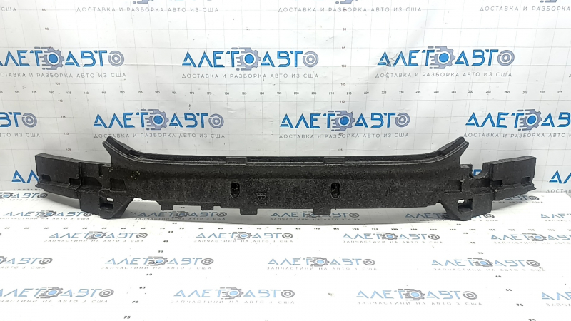 The front bumper absorber of the Volvo XC90 16-23 is broken and dented.