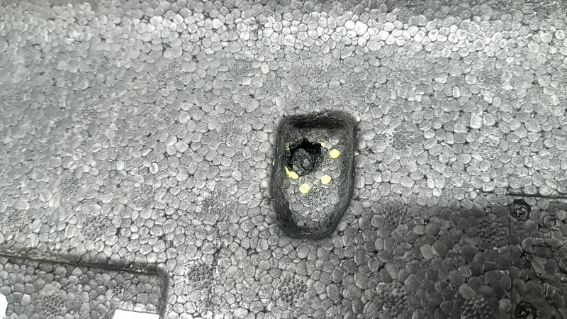 The front bumper absorber of the Volvo XC90 16-23 is broken and dented.