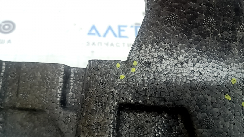 The front bumper absorber of the Volvo XC90 16-23 is broken and dented.