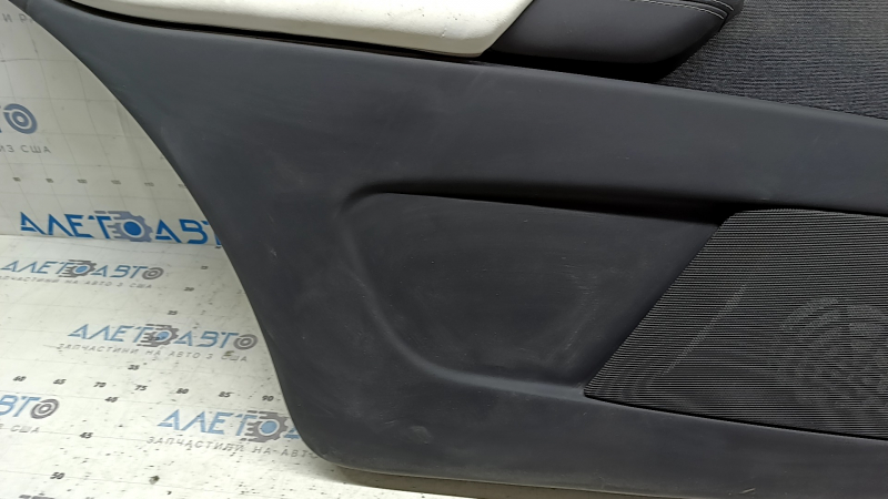 Tesla Model X 22-25 rear left door panel, black, with white leather insert, pierced cushion, dry-cleanable