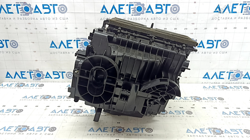 The heater housing is bare, left side of the 2021 Nissan Rogue, us-built, without radiators.